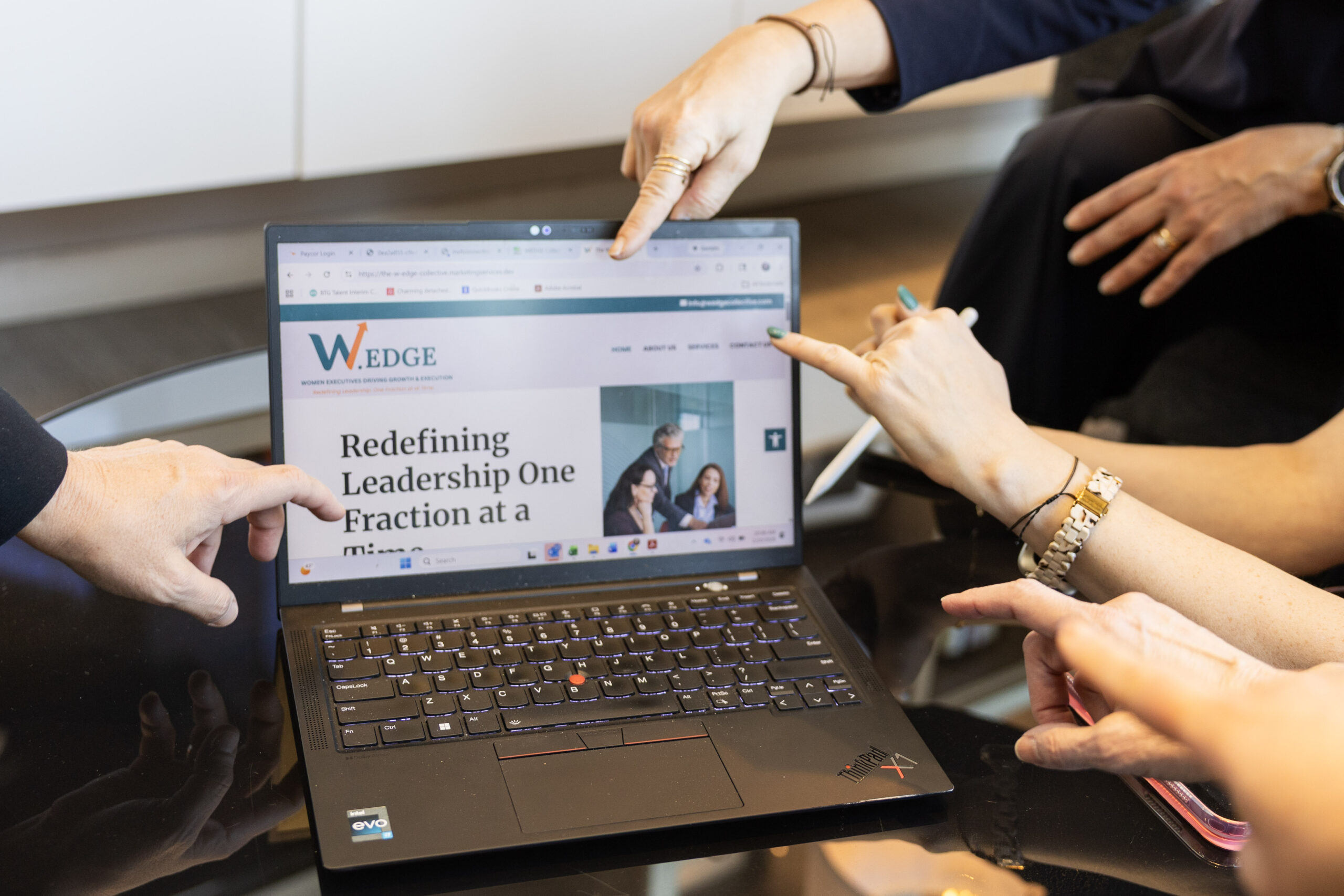 Fractional executives reviewing business strategy and performance on laptop