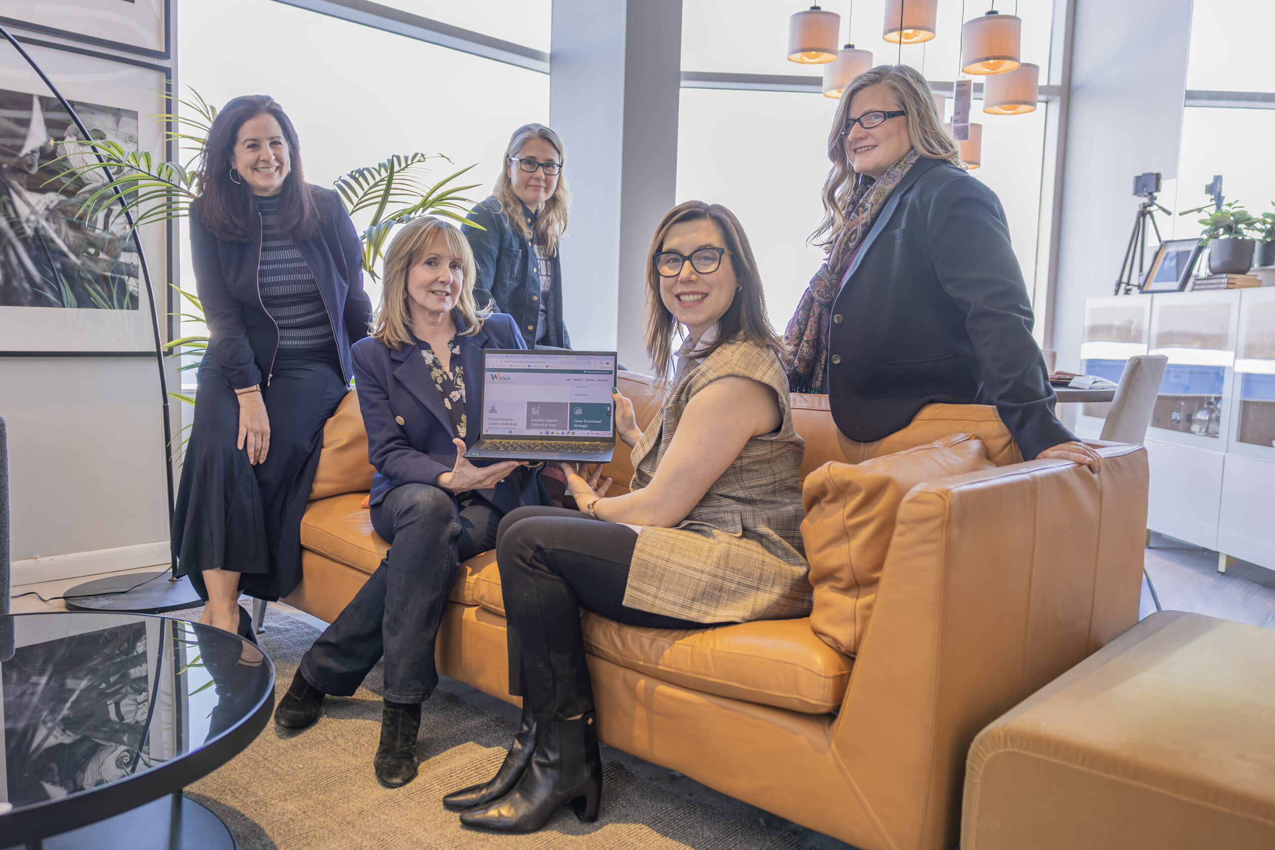 Fractional C-suite leaders presenting business strategy and growth solutions